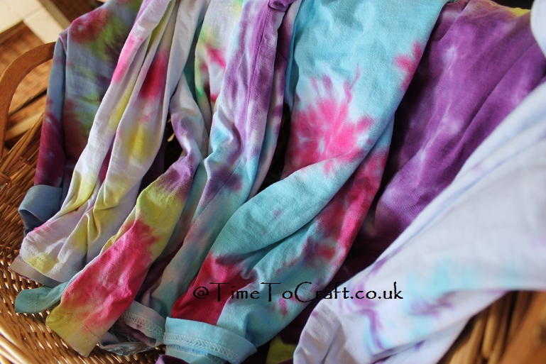 basket of tiedye tshirts