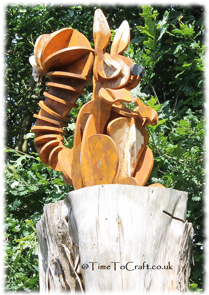 red squirrel statue