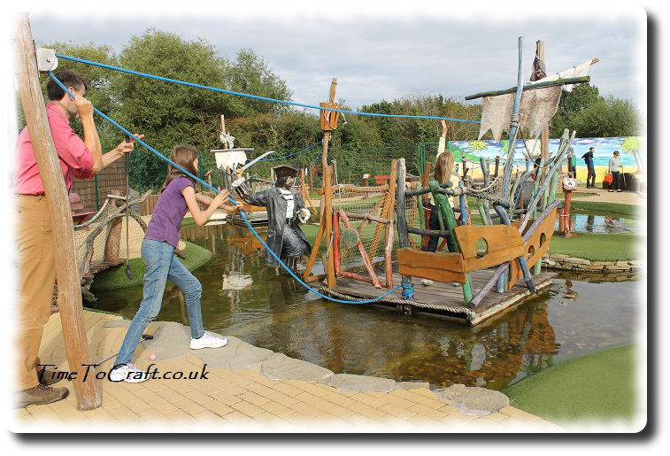 pulling boat at crazy golf group