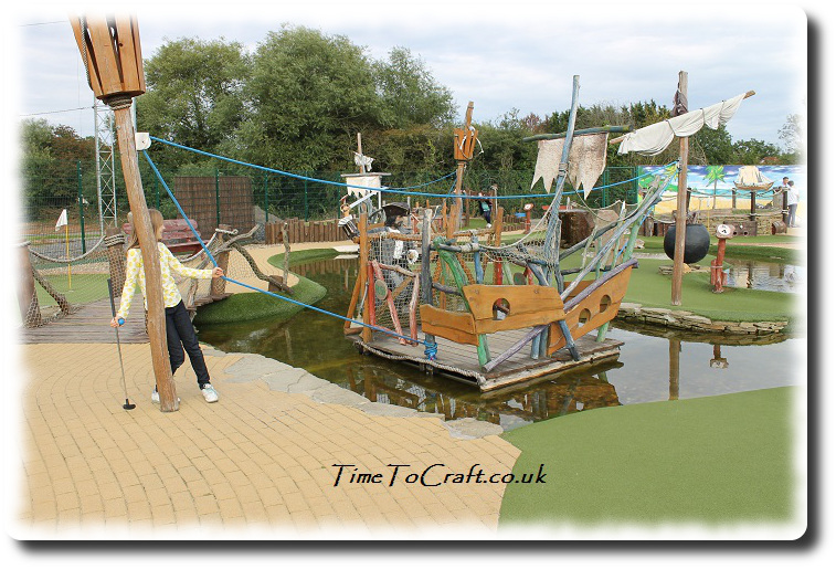 pulling boat at crazy golf