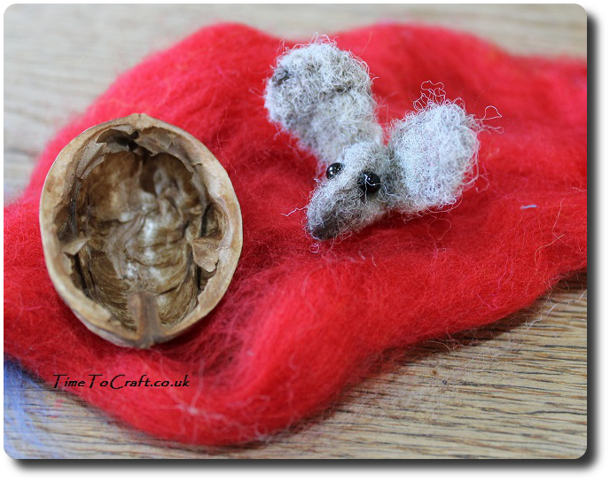 needlefelted mouse head and walnut