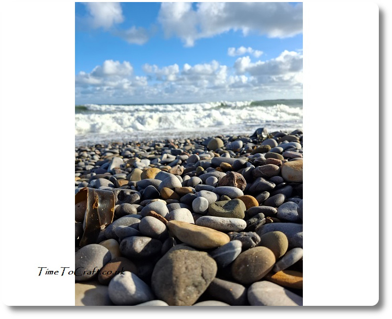 Waves and pebbles on the beach